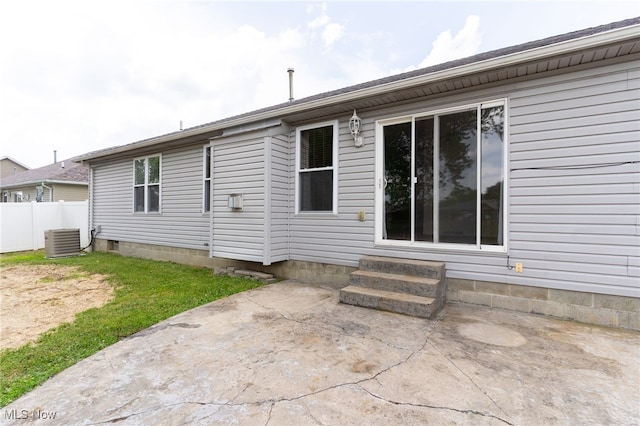 313 Crimson Cir, Campbell, OH 44405 - rear view of property with entry steps and a patio area
