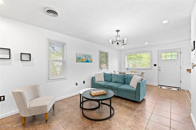 929 Moneta Ave, Aurora, OH 44202 - living area with a chandelier, light tile patterned flooring, and recessed lighting