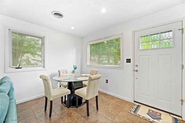 929 Moneta Ave, Aurora, OH 44202 - dining space featuring healthy amount of natural light, light tile patterned floors, and recessed lighting