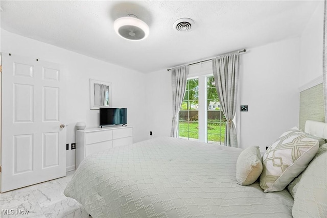 929 Moneta Ave, Aurora, OH 44202 - bedroom with light marble finish floors
