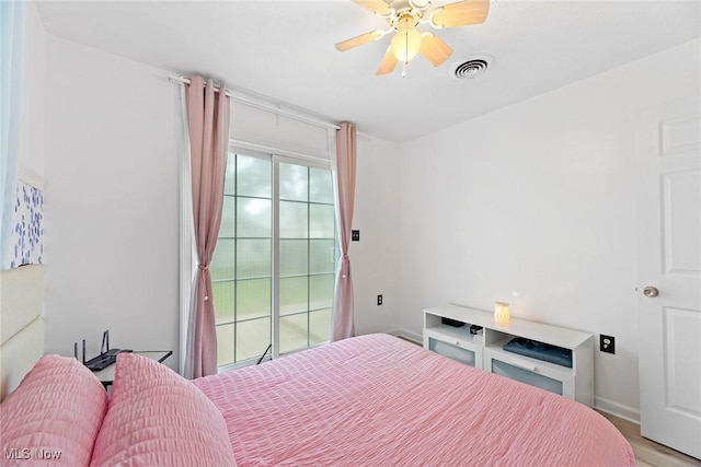 929 Moneta Ave, Aurora, OH 44202 - bedroom with light wood-style floors and a ceiling fan