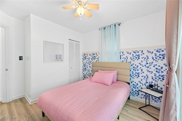 929 Moneta Ave, Aurora, OH 44202 - bedroom featuring wood finished floors, a closet, and a ceiling fan