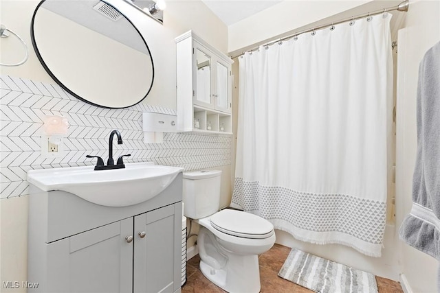 929 Moneta Ave, Aurora, OH 44202 - full bathroom with vanity, tasteful backsplash, tile patterned flooring, and shower / bath combination with curtain