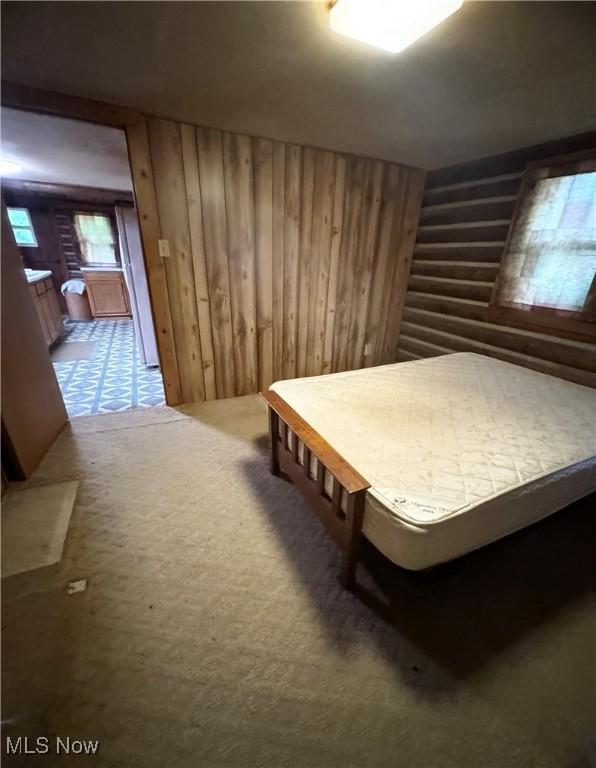 1917 Township Road 26, Killbuck, OH 44637 - bedroom featuring wood walls