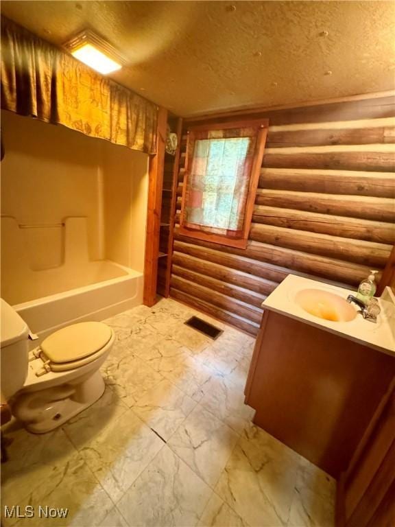 1917 Township Road 26, Killbuck, OH 44637 - bathroom with log walls, vanity, a textured ceiling, marble look tiles, and shower / bathtub combination