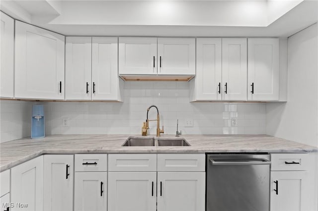 2632 S Green Rd, University Heights, OH 44122 - kitchen featuring dishwasher, white cabinetry, backsplash, and light stone countertops