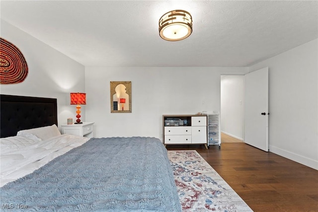 2632 S Green Rd, University Heights, OH 44122 - bedroom featuring wood finished floors and baseboards