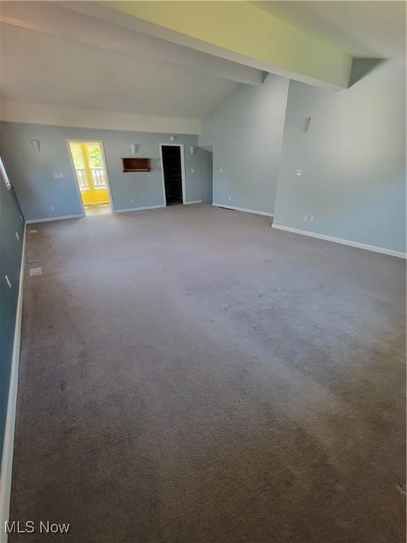 262 High St, Conneaut, OH 44030 - unfurnished living room with carpet flooring