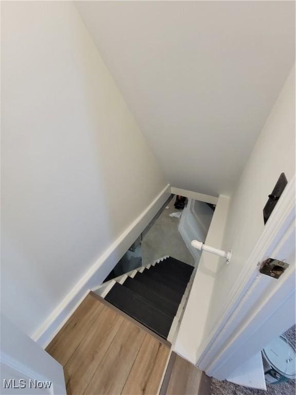262 High St, Conneaut, OH 44030 - stairs with baseboards and wood finished floors