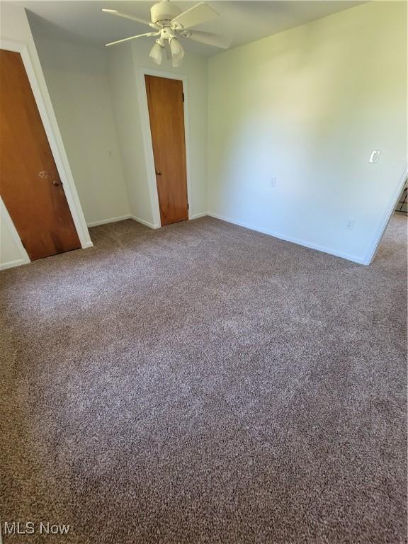 262 High St, Conneaut, OH 44030 - carpeted empty room featuring ceiling fan and baseboards