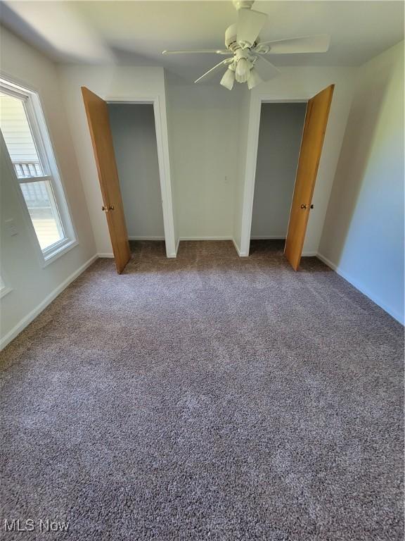 262 High St, Conneaut, OH 44030 - unfurnished bedroom featuring a ceiling fan and carpet