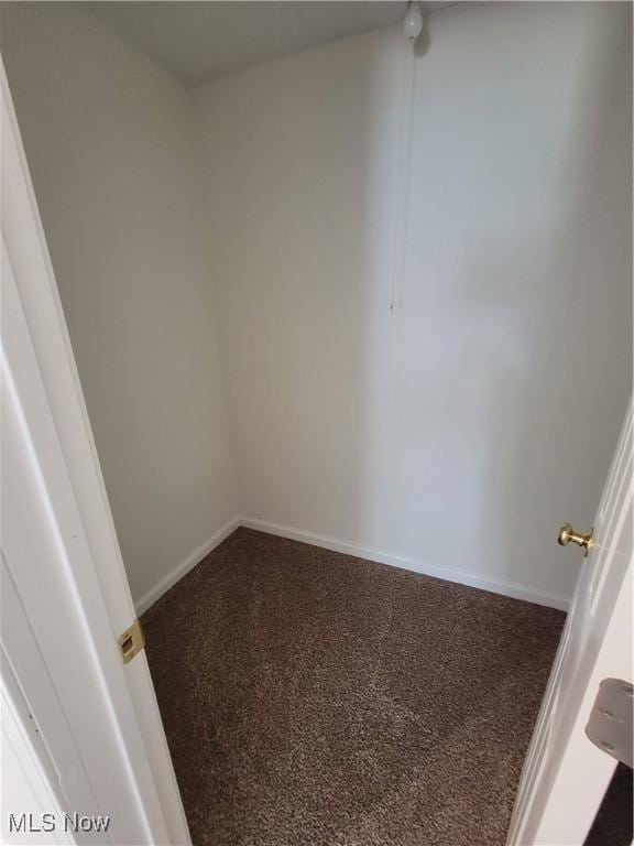 262 High St, Conneaut, OH 44030 - carpeted empty room with baseboards