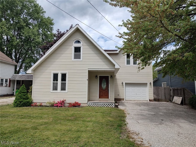 262 High St, Conneaut, OH 44030 - traditional-style house featuring gravel driveway and a garage
