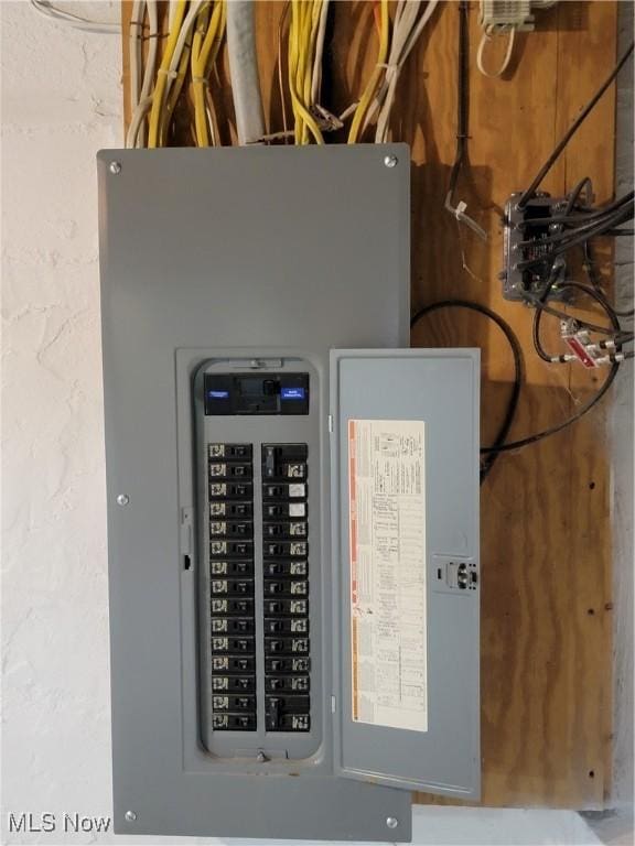 262 High St, Conneaut, OH 44030 - utility room featuring electric panel
