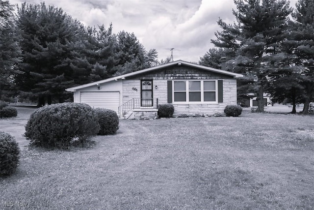 961 Slater Rd, Salem, OH 44460 - view of front of home with an attached garage and stone siding