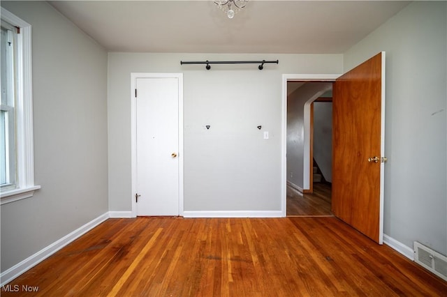 135 Renee Dr, Struthers, OH 44471 - unfurnished bedroom with wood finished floors