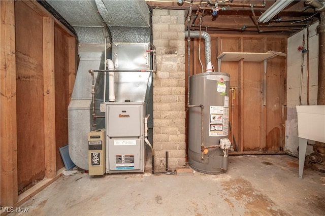 135 Renee Dr, Struthers, OH 44471 - utility room featuring water heater and heating unit