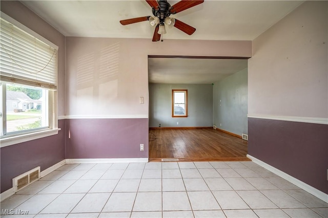 135 Renee Dr, Struthers, OH 44471 - unfurnished room with light wood-type flooring and ceiling fan
