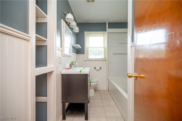 135 Renee Dr, Struthers, OH 44471 - full bathroom with vanity, tile patterned flooring, and a wainscoted wall