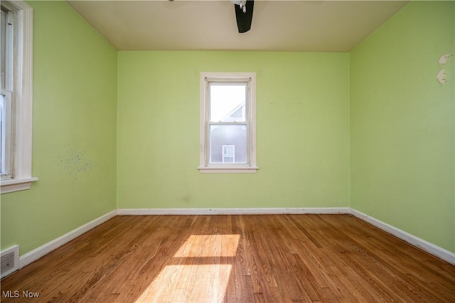 135 Renee Dr, Struthers, OH 44471 - empty room featuring wood finished floors and a ceiling fan