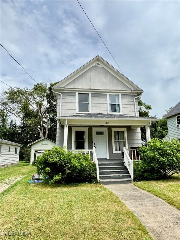 391 Cornell St, Akron, OH 44310 - traditional style home featuring covered porch and a front yard