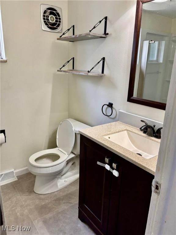 391 Cornell St, Akron, OH 44310 - bathroom featuring vanity and tile patterned floors
