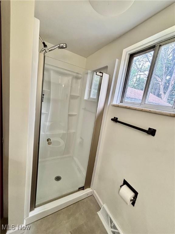 391 Cornell St, Akron, OH 44310 - bathroom featuring a stall shower and plenty of natural light