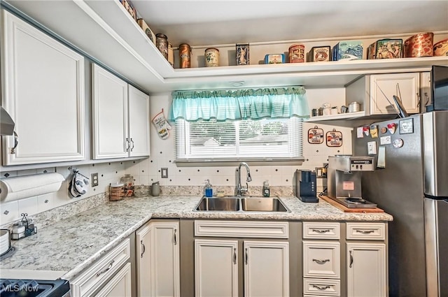 4477 S Warwick Dr, Canfield, OH 44406 - kitchen featuring tasteful backsplash, open shelves, and white cabinetry
