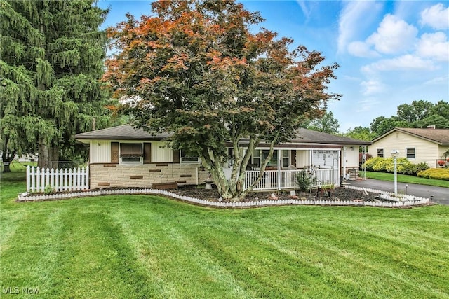 4477 S Warwick Dr, Canfield, OH 44406 - view of front of property featuring a porch, stone siding, and a shingled roof
