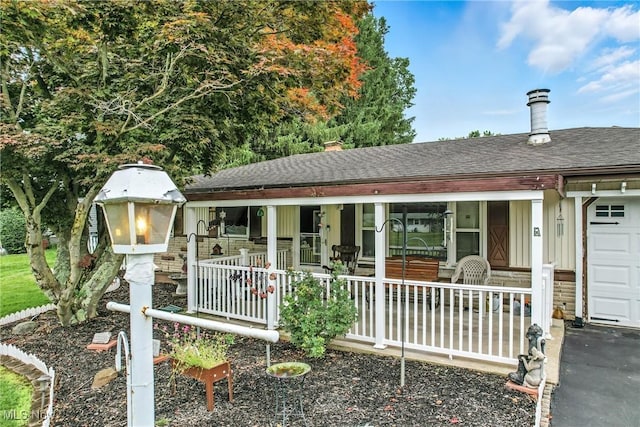4477 S Warwick Dr, Canfield, OH 44406 - view of front of house with a porch and a shingled roof