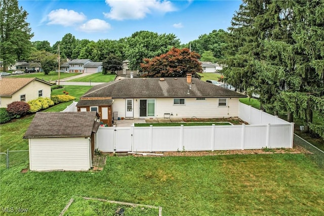 4477 S Warwick Dr, Canfield, OH 44406 - back of house with a gate, a fenced backyard, and a shed