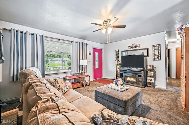 4477 S Warwick Dr, Canfield, OH 44406 - carpeted living room featuring ceiling fan and a glass covered fireplace