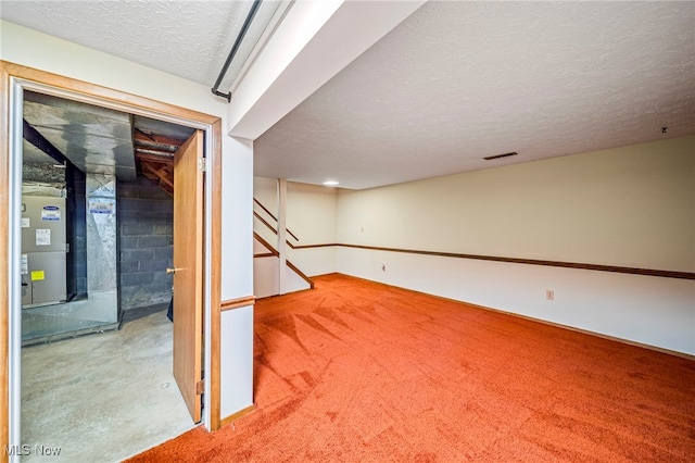 5523 Weston Ct Unit 88A, Willoughby, OH 44094 - finished below grade area with carpet flooring, a textured ceiling, stairway, and heating unit