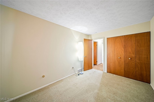 5523 Weston Ct Unit 88A, Willoughby, OH 44094 - unfurnished bedroom with carpet floors, a textured ceiling, and a closet
