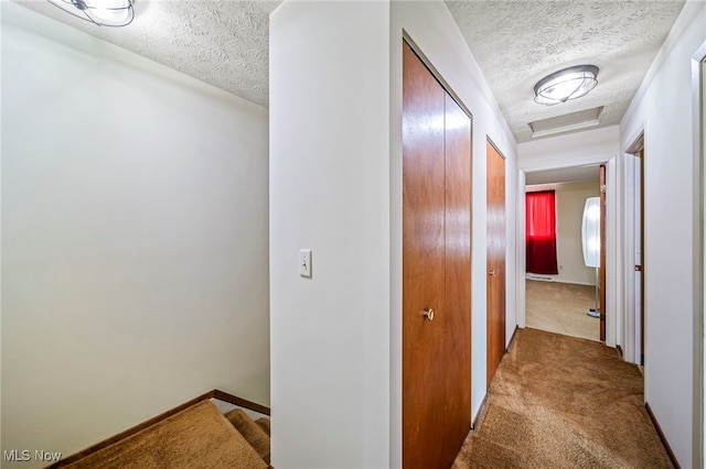 5523 Weston Ct Unit 88A, Willoughby, OH 44094 - hall with a textured ceiling, carpet, and stairs