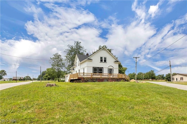 13050 Diagonal Rd, Salem, OH 44460 - view of front of home with a wooden deck and a front yard