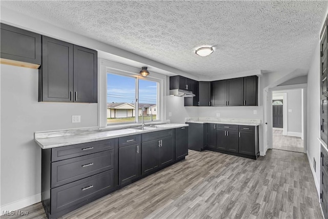 13050 Diagonal Rd, Salem, OH 44460 - kitchen featuring light wood finished floors and a textured ceiling