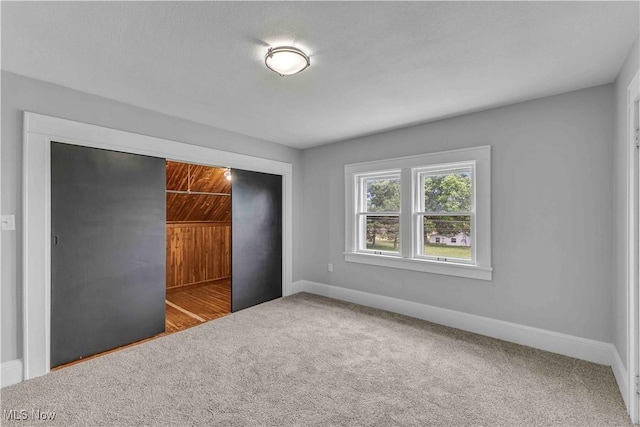 13050 Diagonal Rd, Salem, OH 44460 - unfurnished bedroom with carpet and a closet