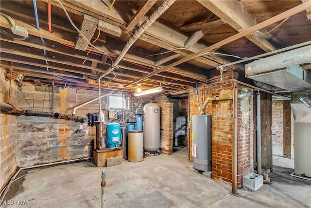 13050 Diagonal Rd, Salem, OH 44460 - unfinished below grade area with water heater, a water pressure tank, and a water softener