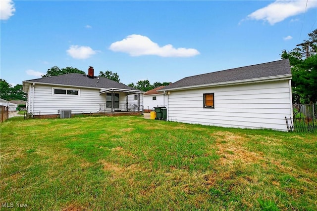 738 Sterling Rd, Wickliffe, OH 44092 - back of house with a chimney