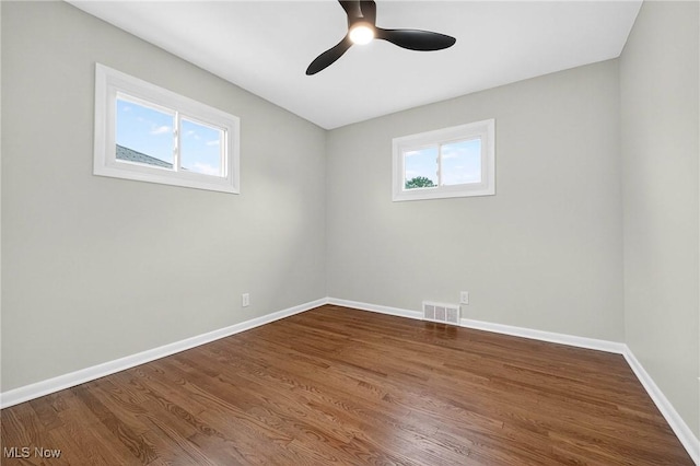 738 Sterling Rd, Wickliffe, OH 44092 - unfurnished room featuring dark wood-style floors and ceiling fan