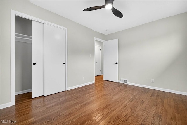 738 Sterling Rd, Wickliffe, OH 44092 - unfurnished bedroom featuring wood finished floors, a closet, and a ceiling fan