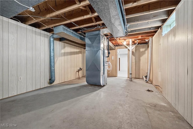 738 Sterling Rd, Wickliffe, OH 44092 - unfinished basement featuring heating unit and wood walls
