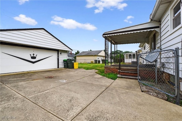738 Sterling Rd, Wickliffe, OH 44092 - view of patio featuring a garage and an outdoor structure