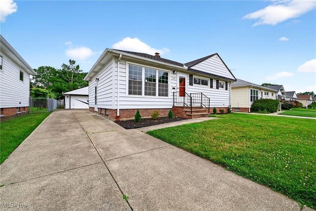 738 Sterling Rd, Wickliffe, OH 44092 - view of front of home with an outbuilding, a garage, and crawl space