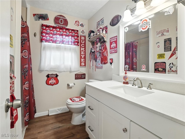 4833 Middle Ridge Rd, Perry, OH 44081 - full bathroom featuring vanity, wood finished floors, and a shower with shower curtain
