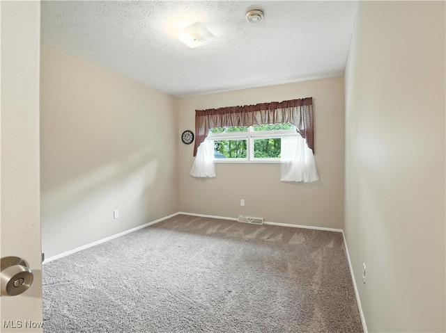 4833 Middle Ridge Rd, Perry, OH 44081 - carpeted empty room with a smoke detector and a textured ceiling