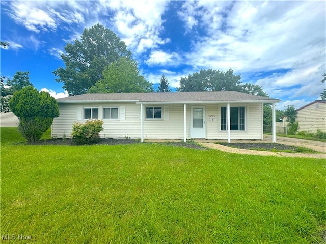 24525 Sherborne Rd, Bedford Heights, OH 44146 - ranch-style home with a front yard