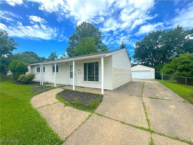 24525 Sherborne Rd, Bedford Heights, OH 44146 - single story home featuring a garage, an outbuilding, and covered porch