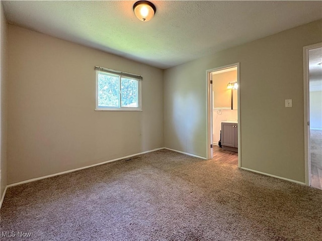 24525 Sherborne Rd, Bedford Heights, OH 44146 - empty room with carpet and a textured ceiling